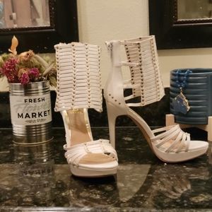 Scene Sanje White Ankle Strap Stilettos.